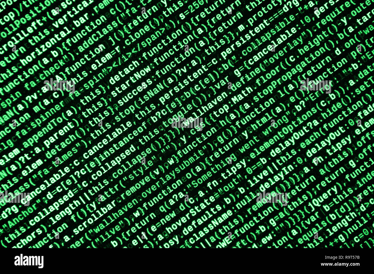 Writing programming code on laptop. Digital binary data on computer ...