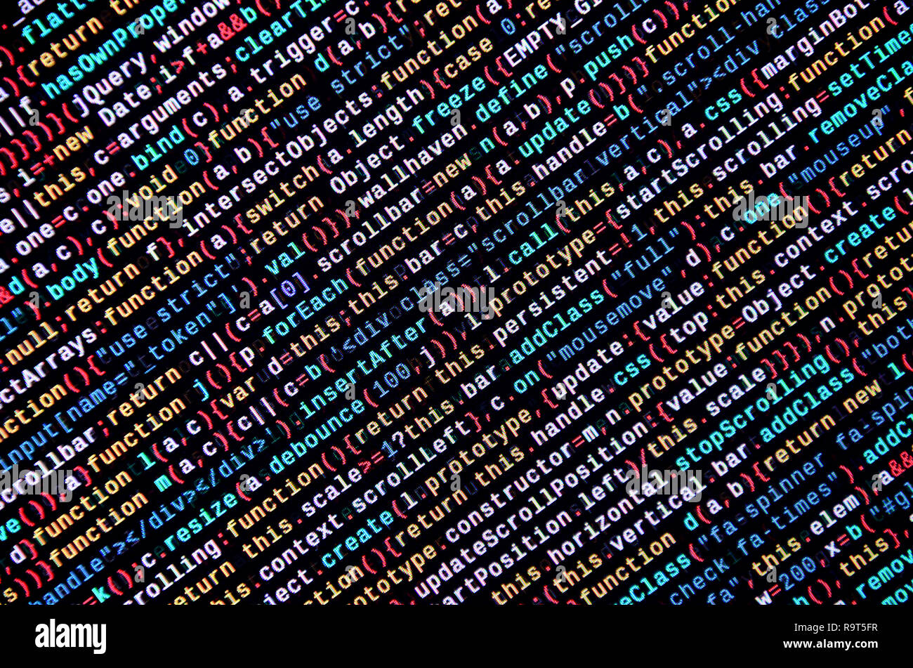 Writing programming code on laptop. Digital binary data on computer ...