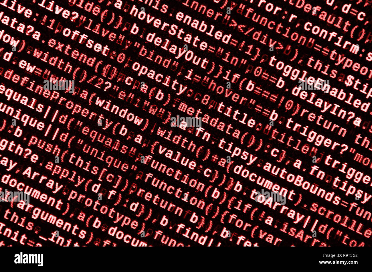 Writing programming code on laptop. Digital binary data on computer ...