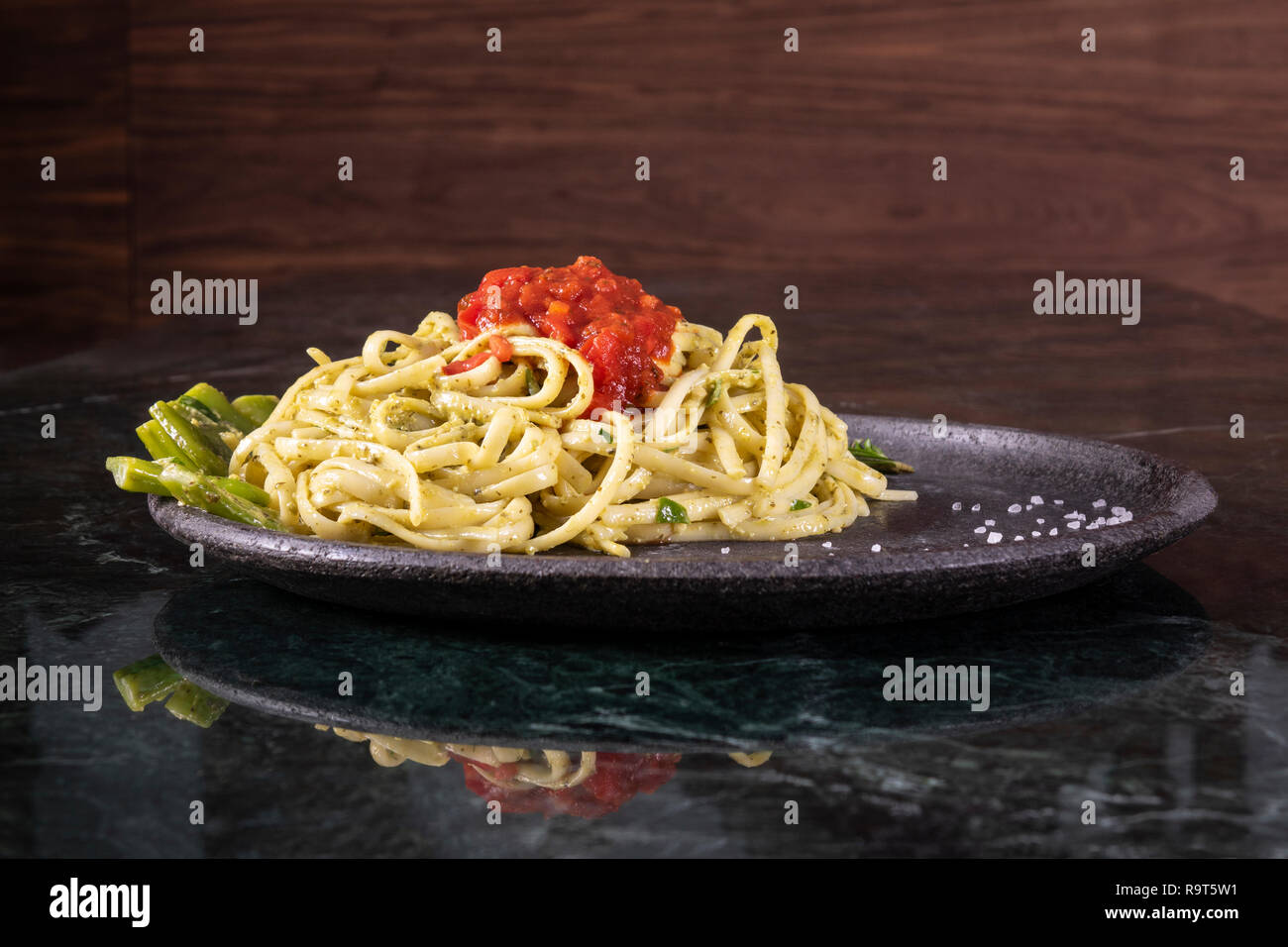 Spaghetti carbonara on marble plate. Closeup Stock Photo