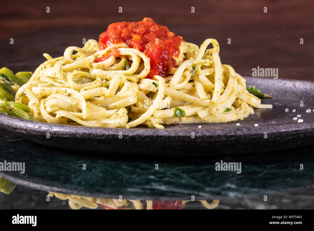 Spaghetti carbonara on marble plate. Closeup Stock Photo