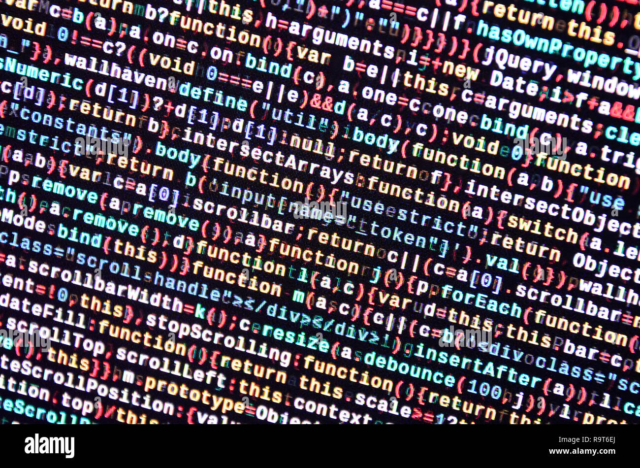 Writing programming code on laptop. Digital binary data on computer ...