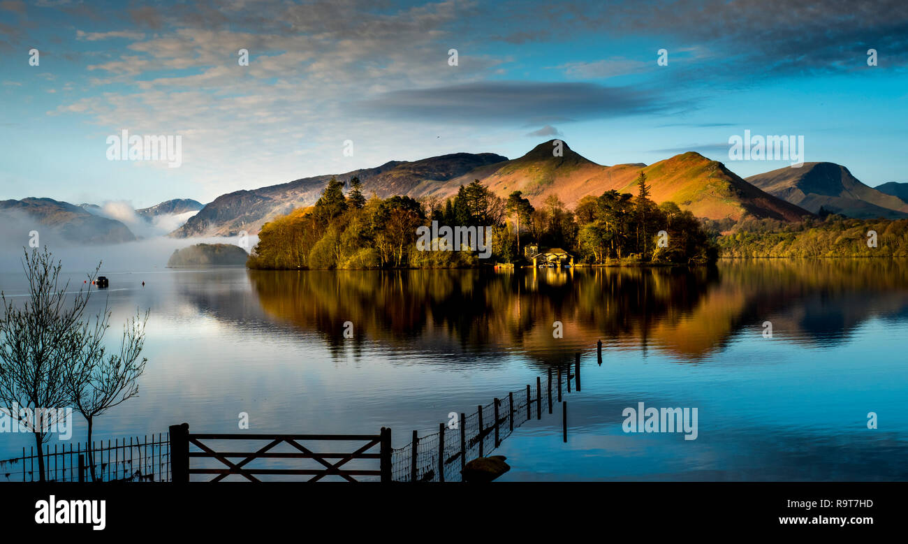 Derwentwater in the Lake District National Park with a view of Catbells and Derwent Isle across the lake at sunrise Stock Photo