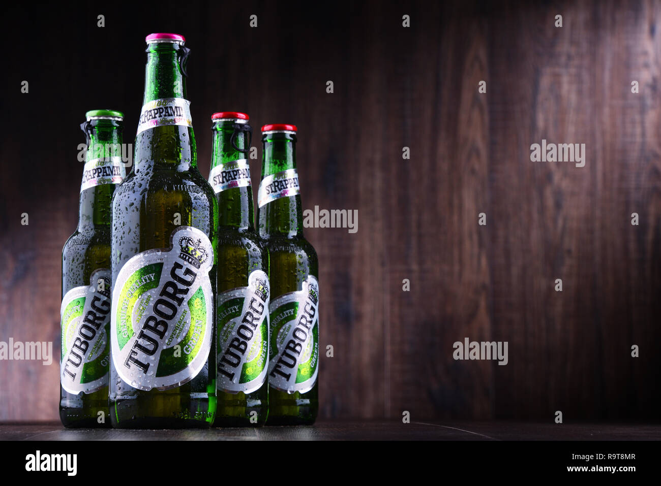 POZNAN, POL - JUN 8, 2018: Bottles of Tuborg beer, produced by a Danish brewing company founded in 1873 near Copenhagen Stock Photo