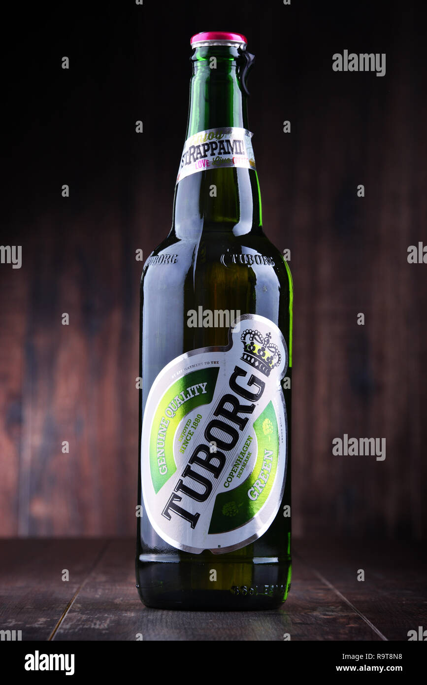 POZNAN, POL - JUN 8, 2018: Bottle of Tuborg beer, produced by a Danish brewing company founded in 1873 near Copenhagen Stock Photo