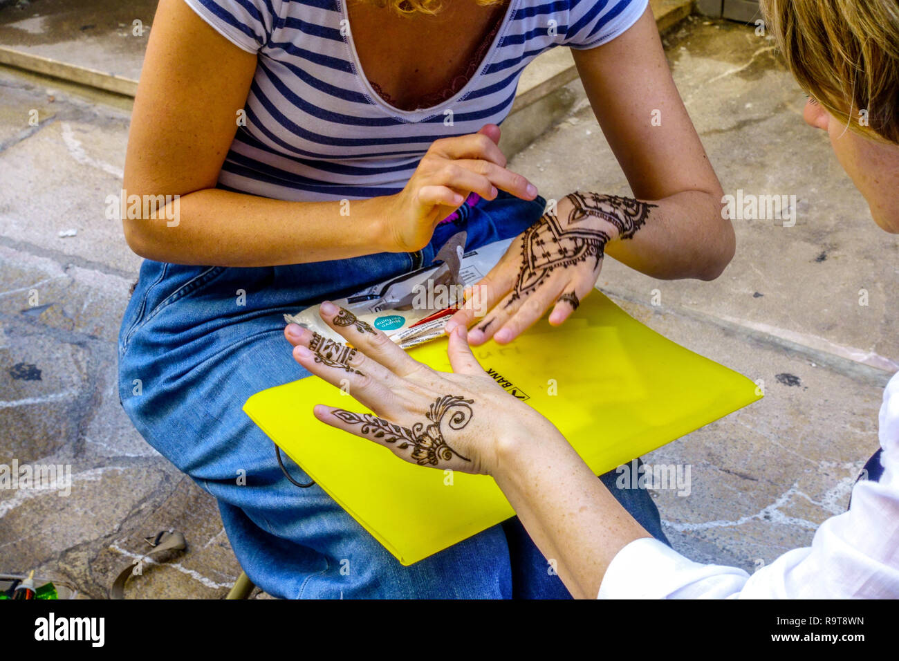 Henna tattoo hands on street, Palma de Mallorca, Spain Stock Photo
