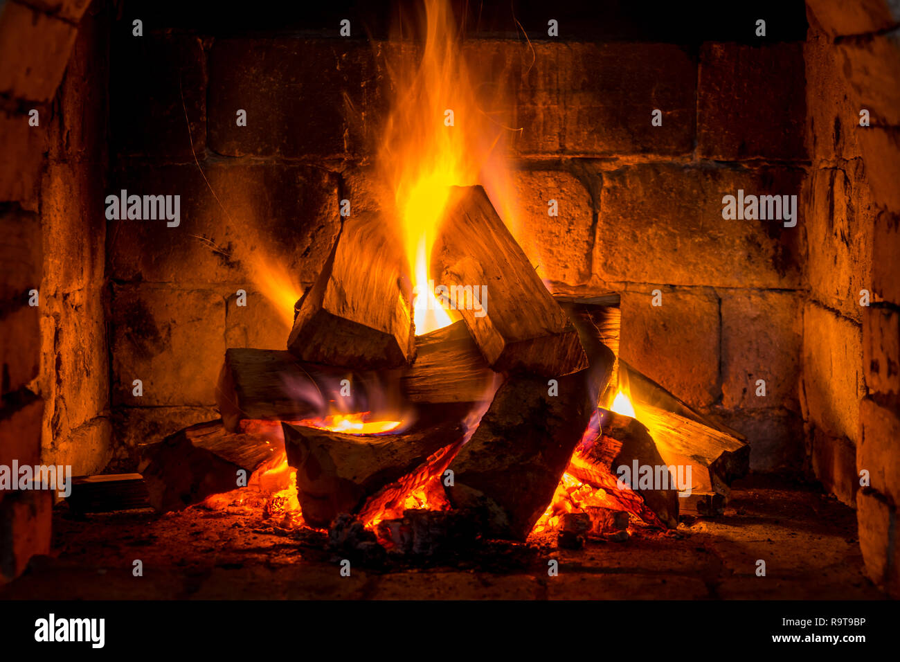 Wood Burning In A Cozy Fireplace At Home Keep Warm Stock Photo