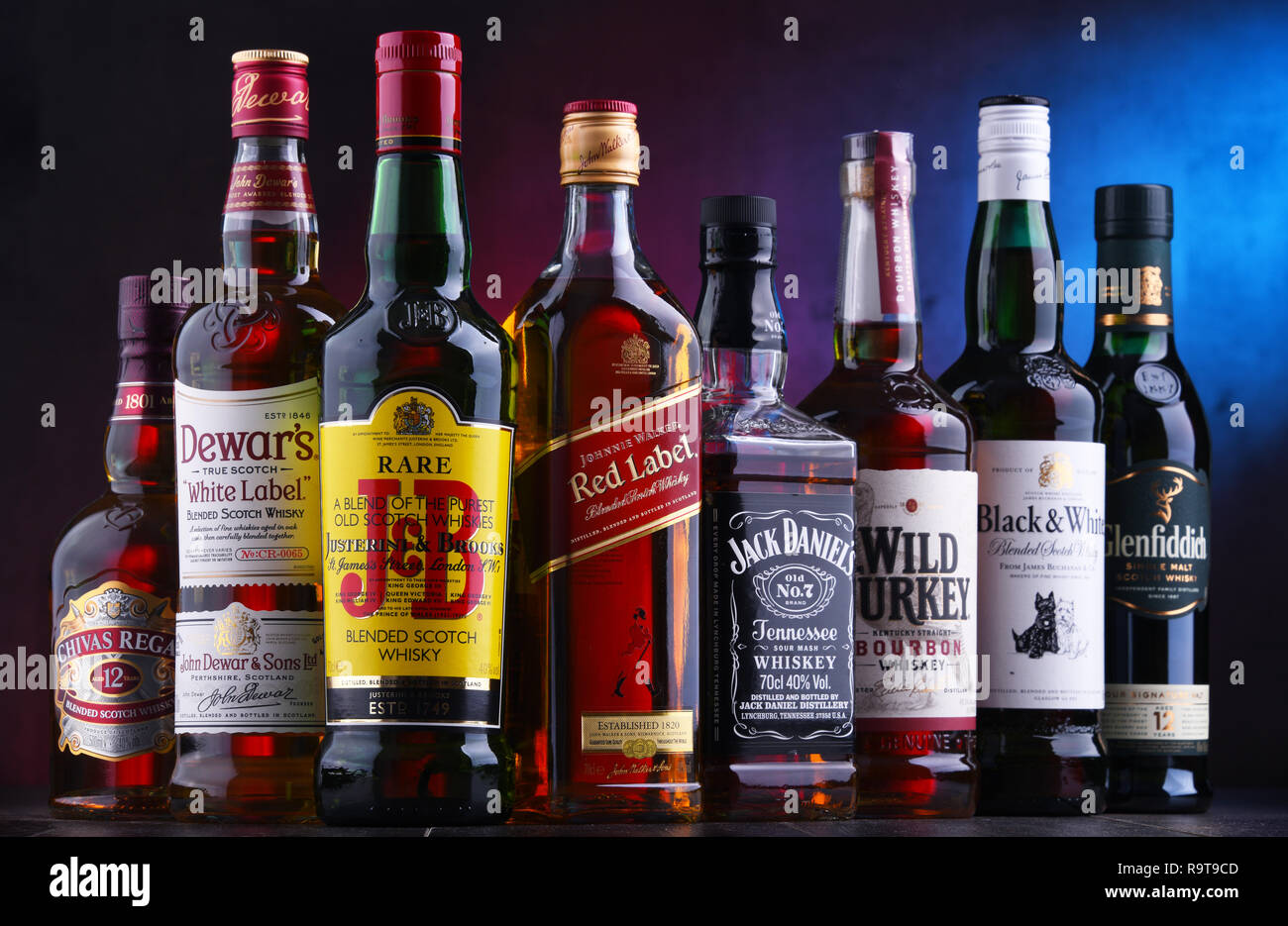 POZNAN, POLAND - NOV 16, 2018: Bottles of several global whiskey brands, the most popular liquor in the world. Stock Photo