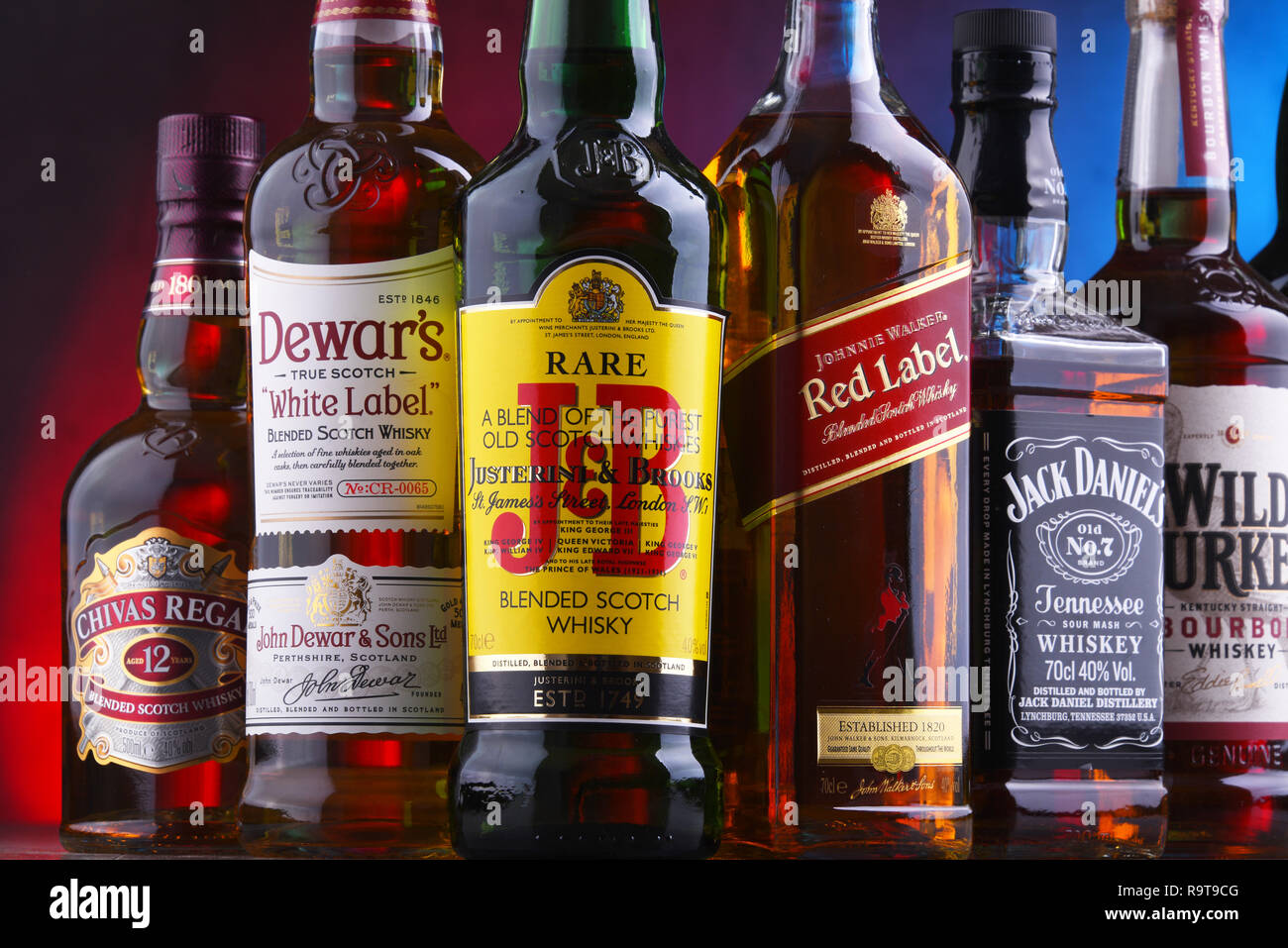 POZNAN, POLAND - NOV 16, 2018: Bottles of several global whiskey brands, the most popular liquor in the world. Stock Photo