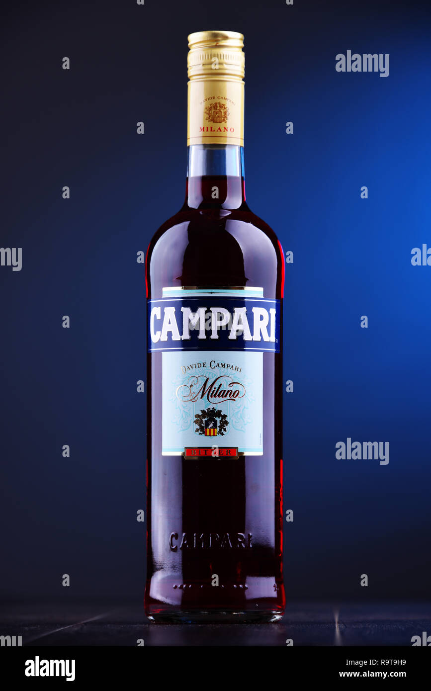 POZNAN, POLAND - NOV 29, 2018: Bottle of Campari, an alcoholic liqueur containing herbs and fruit (including chinotto and cascarilla), invented in 186 Stock Photo