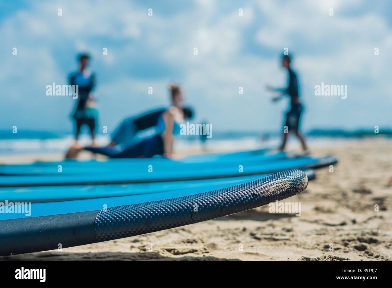 Blue surfboards in the sand on the beach Stock Photo Alamy
