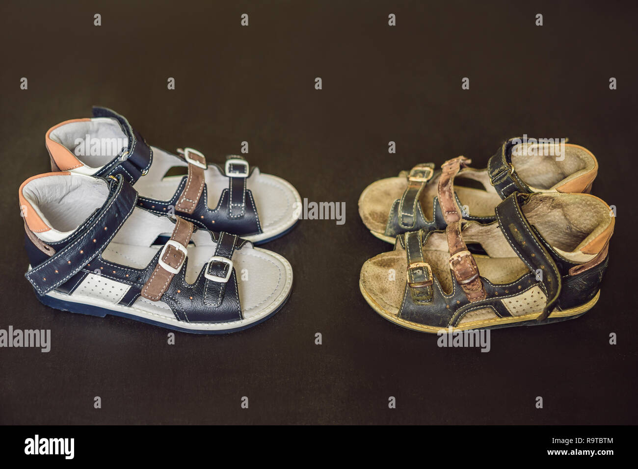 Old and new children's orthopedic shoes. Thomas Heel, arch support