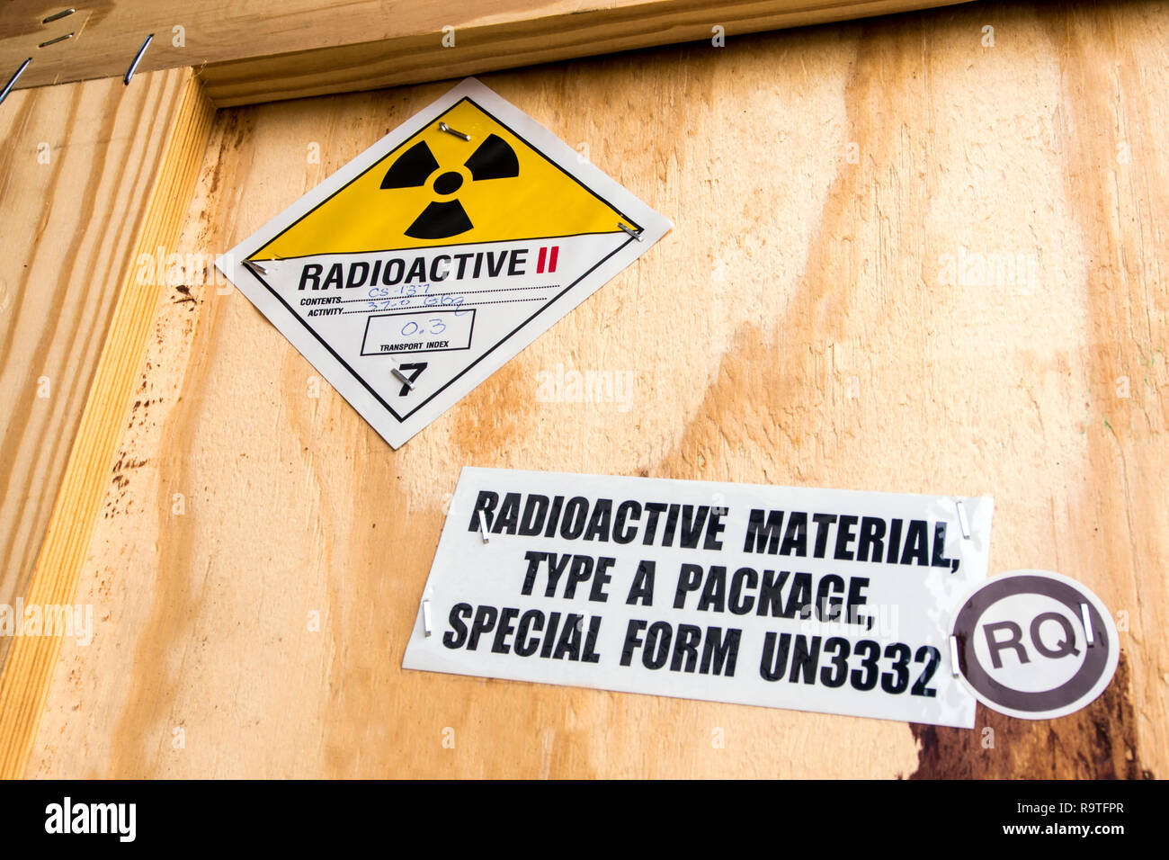 Radioactive material label beside the transportation wooden box Type A