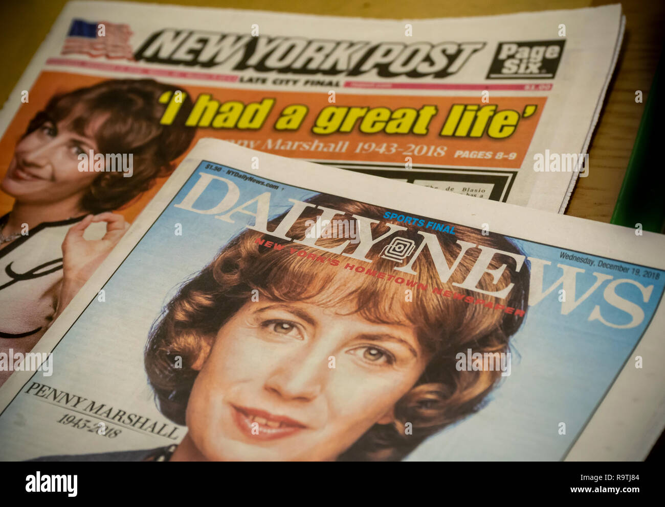 Front pages and headlines of the New York Post and New York Daily News newspapers on Wednesday, December 19, 2018 report on the death of actor/director/producer Penny Marshall. Marshall passed away on Monday from complications related to diabetes. (Â© Richard B. Levine) Stock Photo