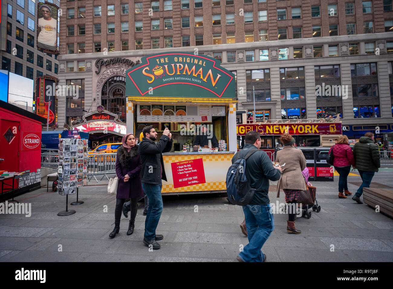 New York,NY/USA-December 17, 2018 The kiosk of the Original Soupman serves soup for you in Times Square in New York on Monday, December 17, 2018. The presence in Times Square is its first brick-and-mortar store since emerging from bankruptcy with new owners. The company also supplies New York City public schools and is available in many delis and supermarkets. (Â© Richard B. Levine) Stock Photo