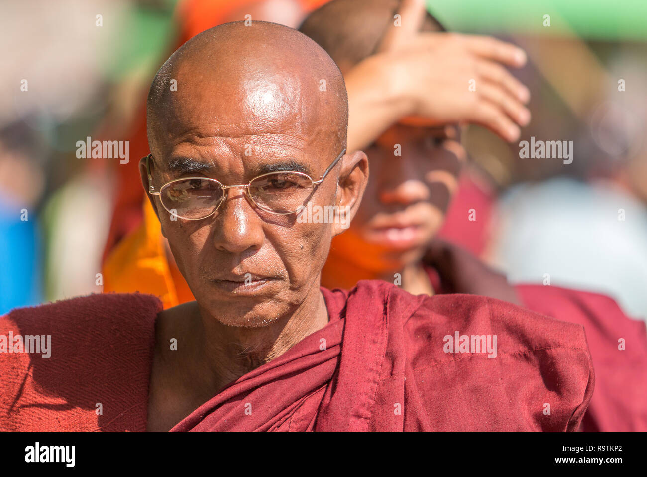 Buddhist monks in Myanmar market Stock Photo