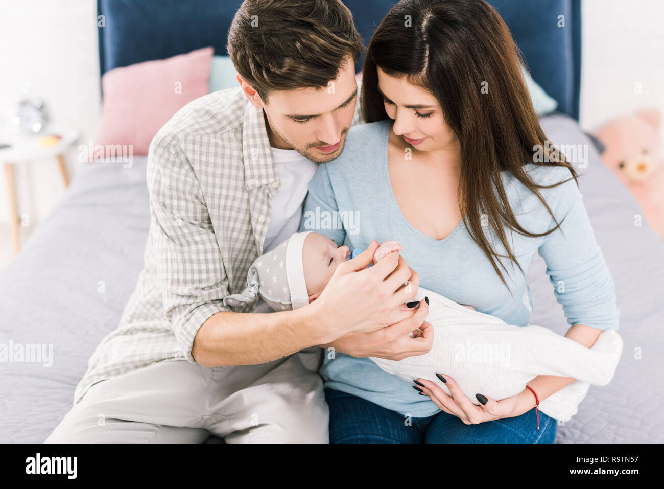 Cute baby store with parents