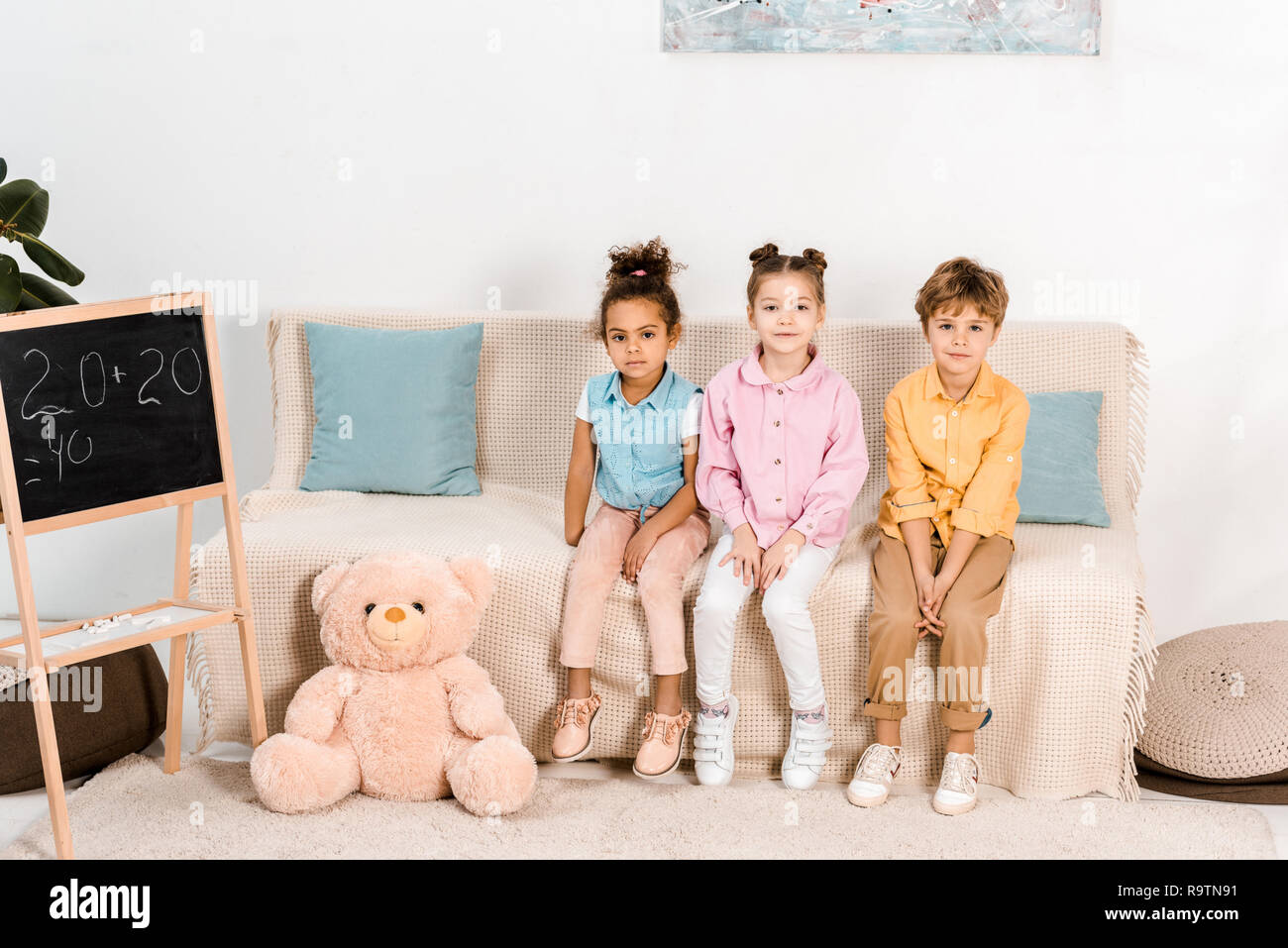 Preteen girls on couch hi-res stock photography and images - Alamy