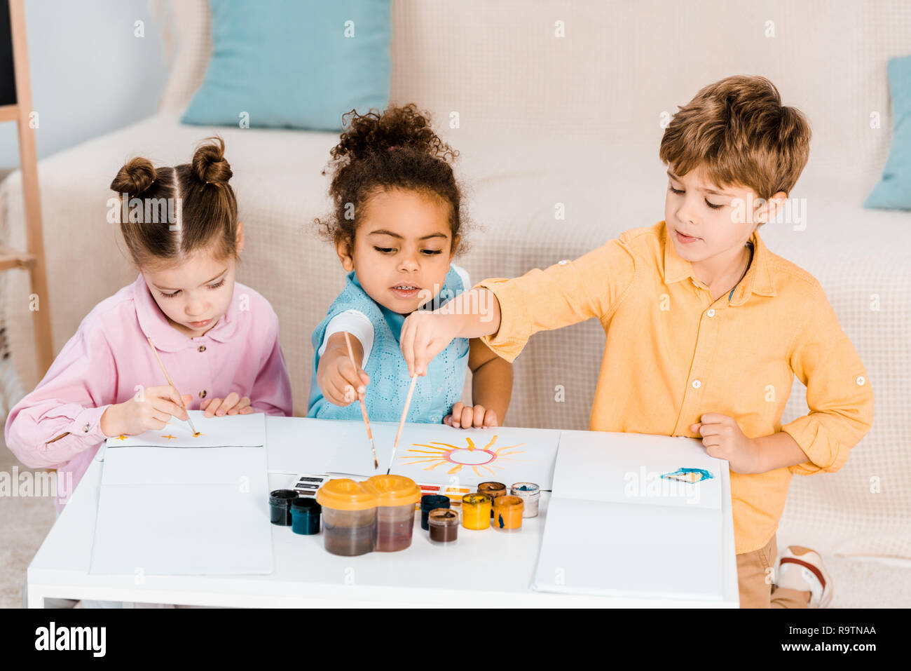 High angle of children painting hi-res stock photography and images - Alamy