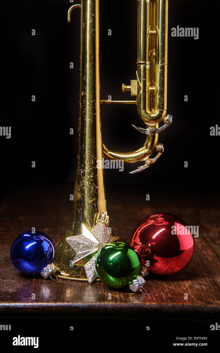 Seasonal Christmas and the holidays musical instrument trumpet with ...