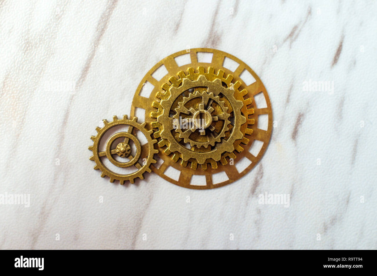 Two gears in motion symbolic of inspiration metaphor concept Stock Photo Alamy