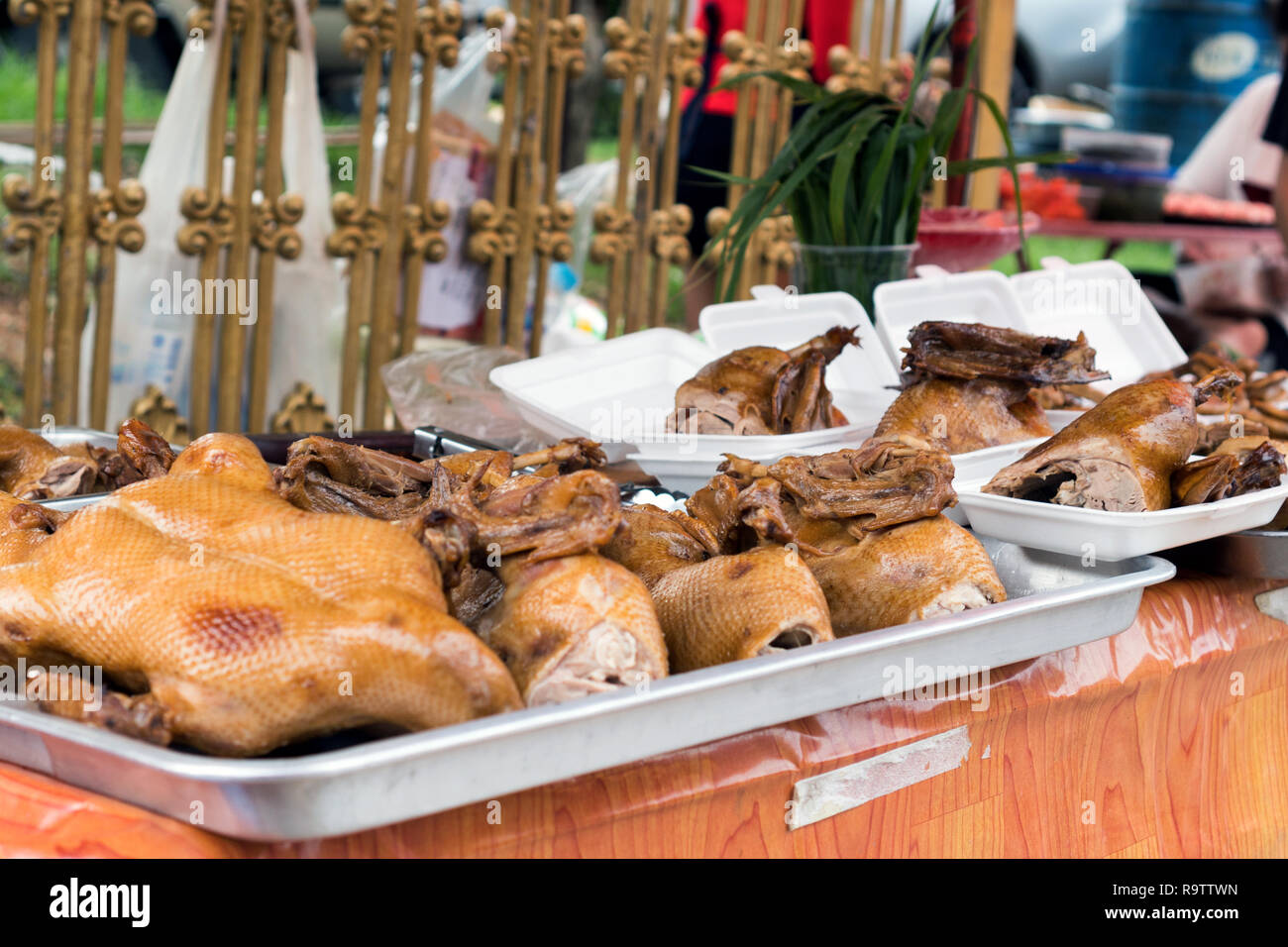 Roasted Chickens / Ducks at Outdoor Street Vendor in Phuket, Thailand Stock Photo