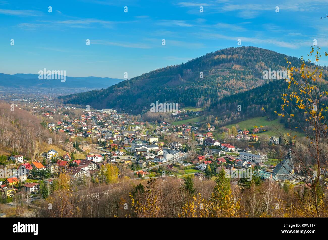 SZCZYRK, POLAND - NOVEMBER 12, 2018: Beautiful mountain town in the valley in Szczyrk, Poland. Stock Photo