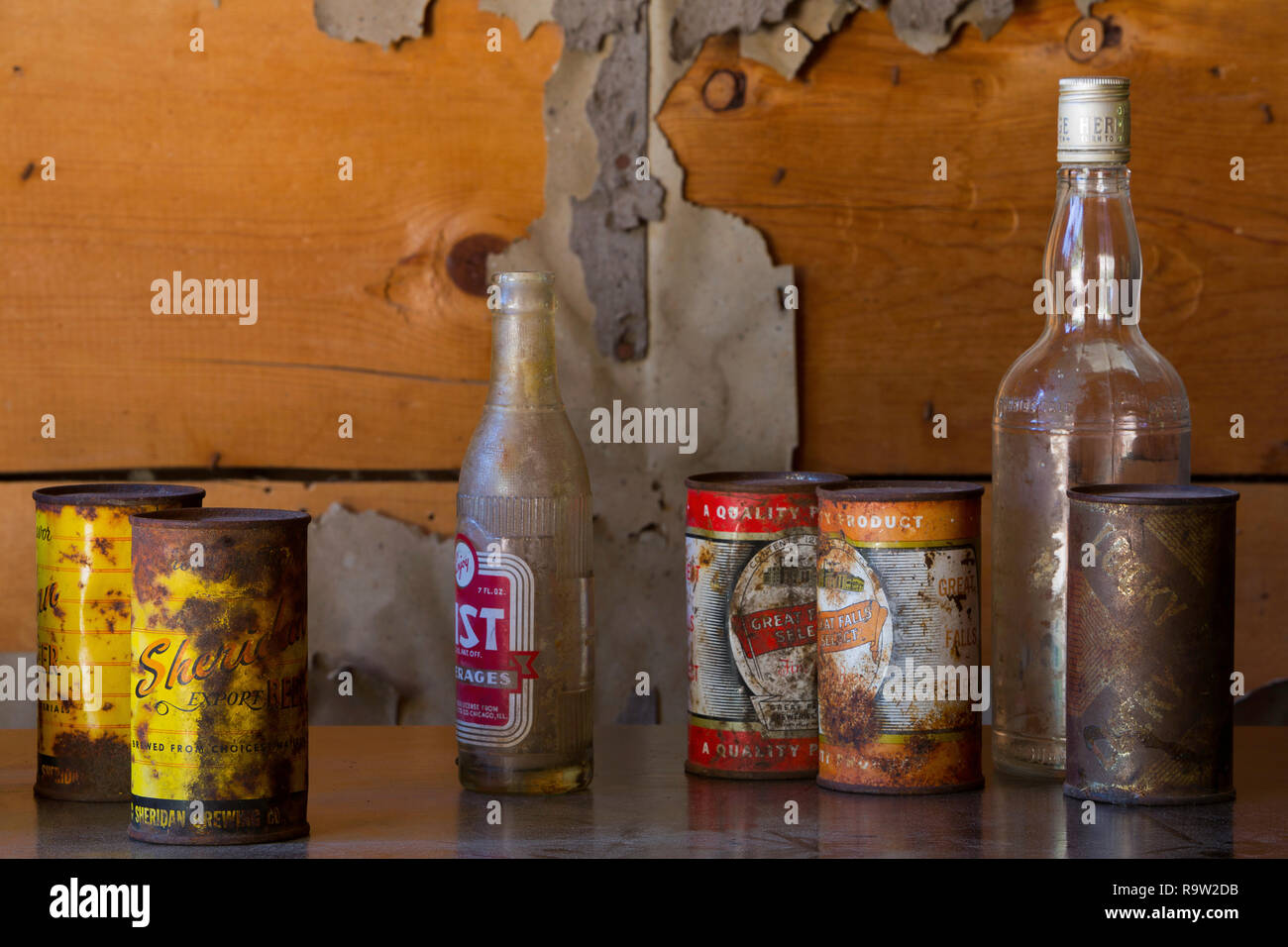 Old bottles and cans in the ghost town of Garnet, Montana. Stock Photo