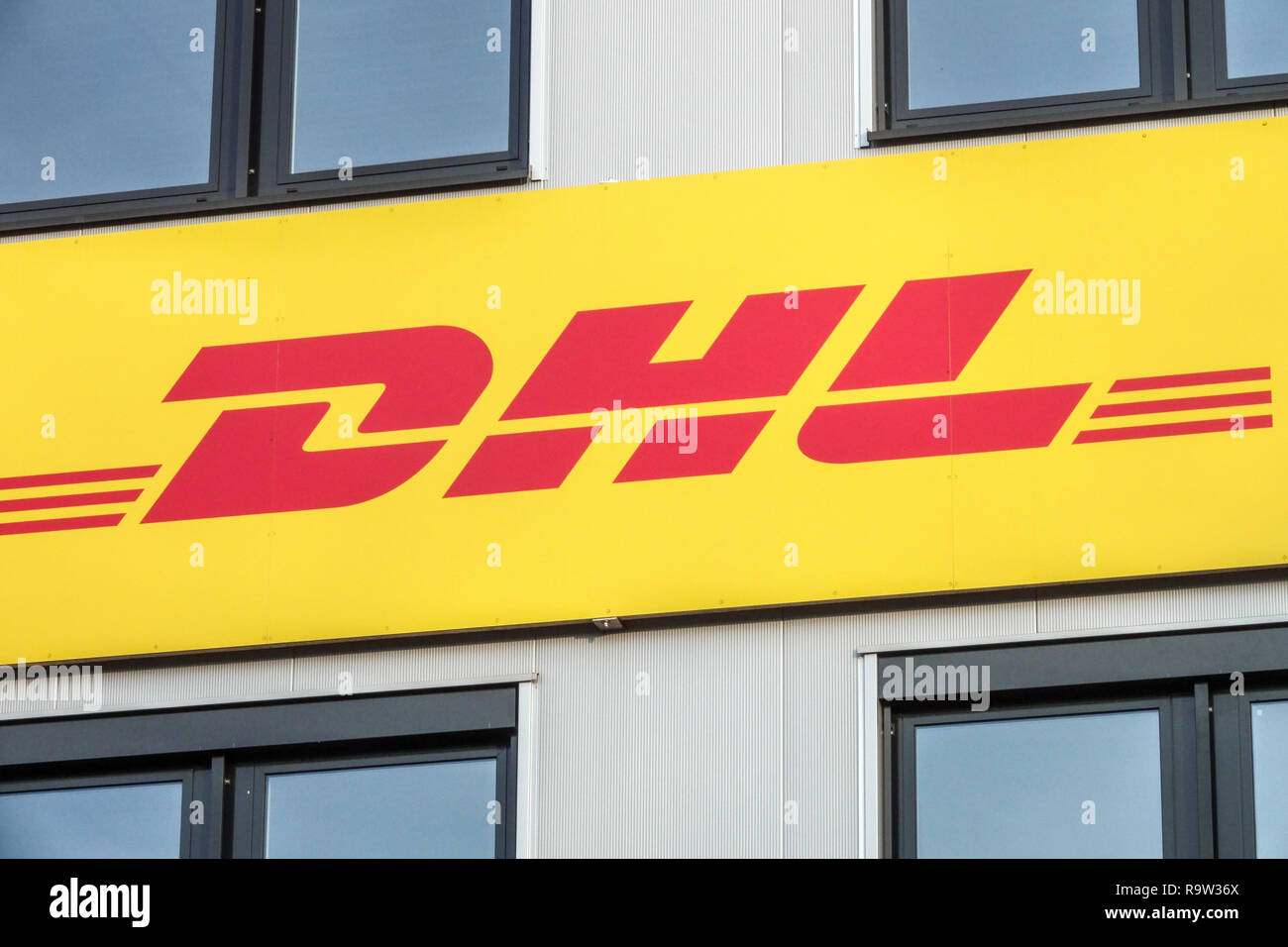 DHL logo Berlin Germany DHL sign Stock Photo - Alamy