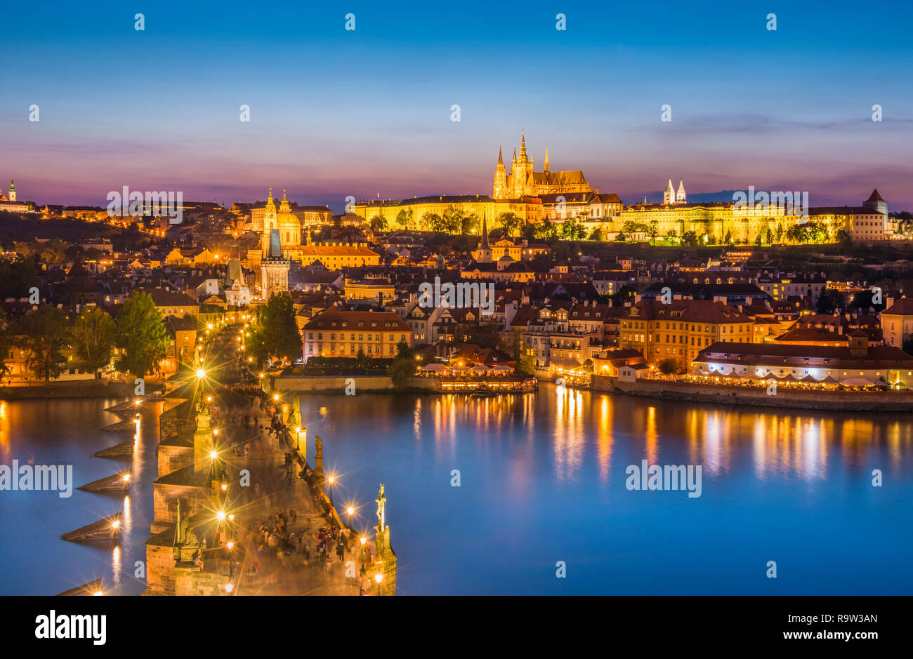 Prague skyline at night with Charles bridge Prague castle and St Vitus cathedral on the hillside of Mala Strana Prague Czech Republic Europe Stock Photo