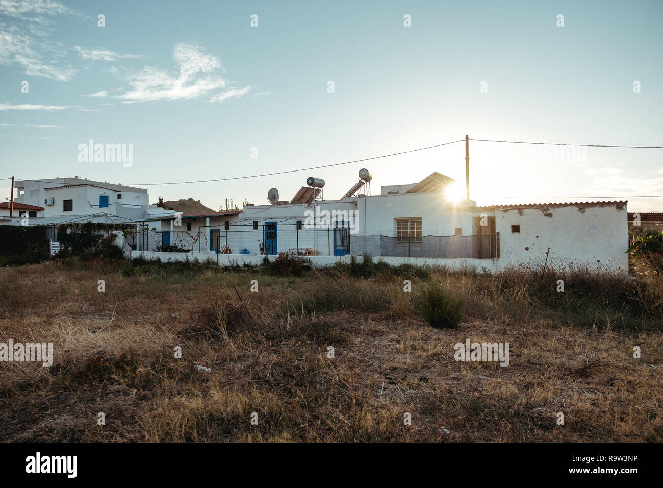 small houses in sunset, faliraki, Rhodes, Greece Stock Photo