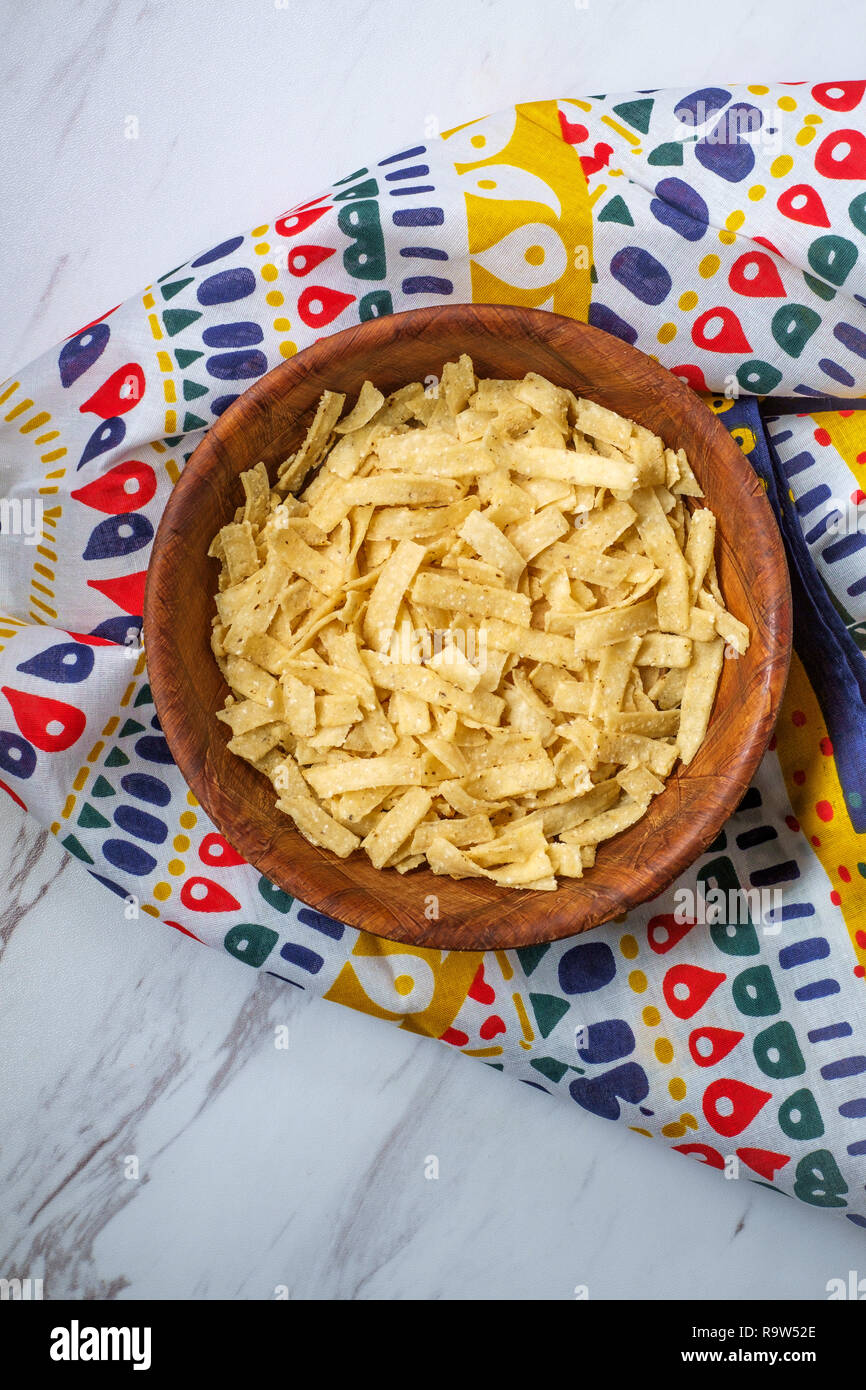 Crispy soup topping Mexican corn tortilla chip strips Stock Photo Alamy