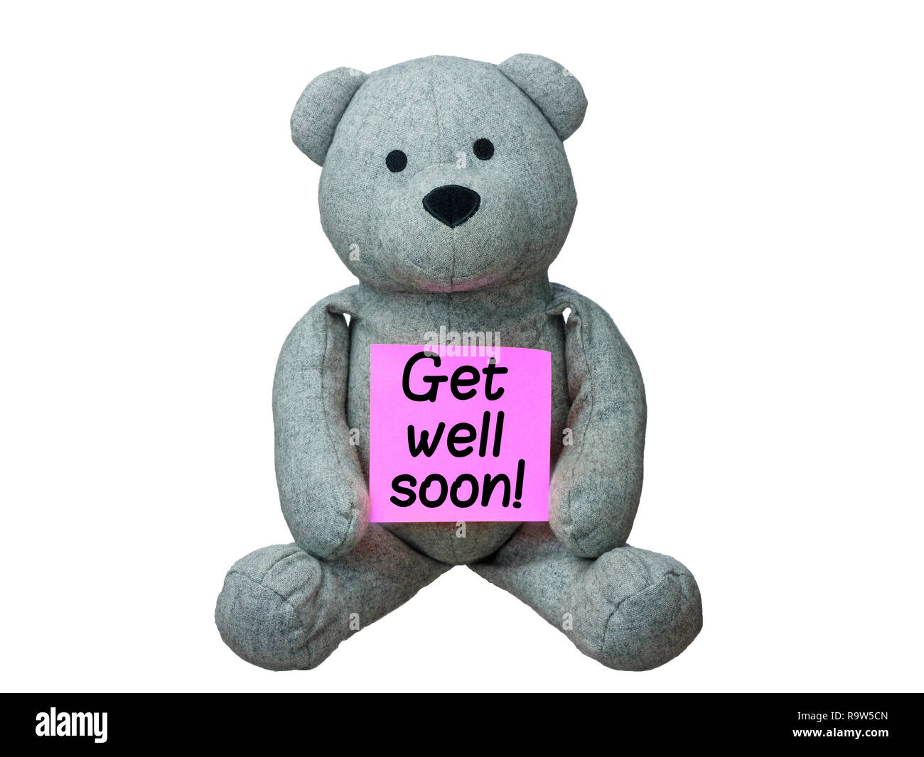 Teddy Bear holding card get well soon isolated Stock Photo