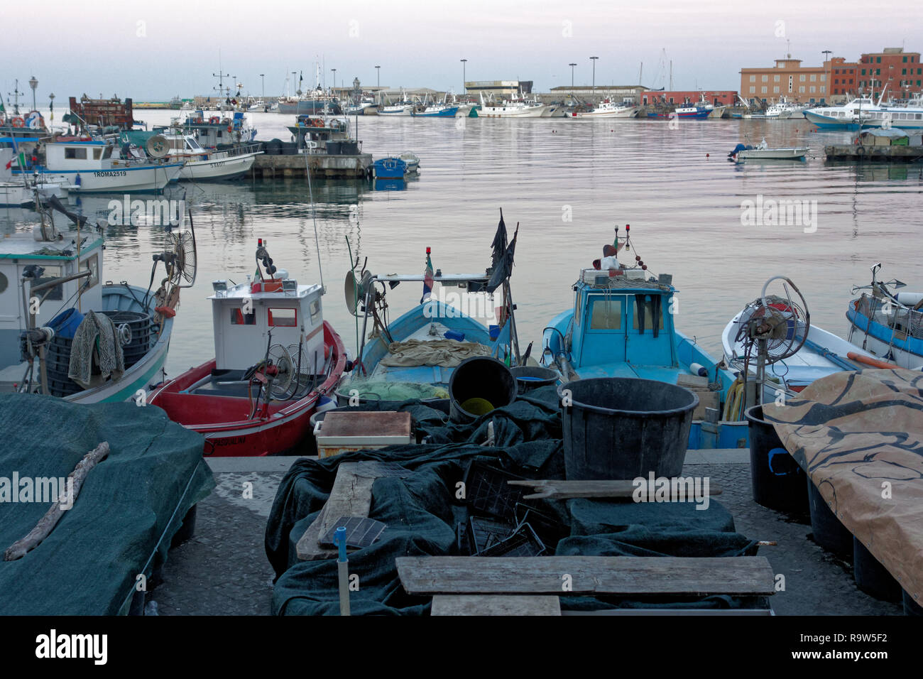 Anzio, Italy - August 2014: Boats in the harbour at twilight Stock Photo