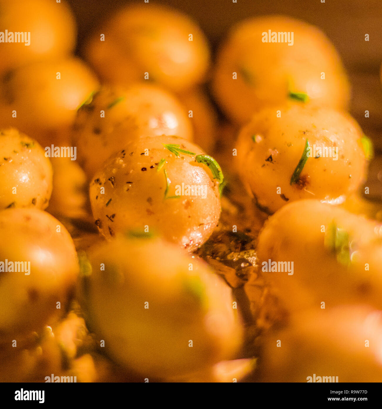 rustic food and homemade cooking styled concept - roasted potatoes in ...