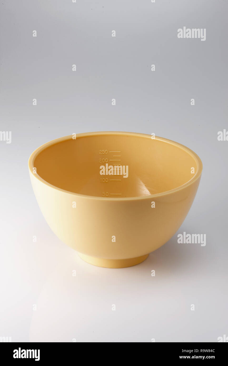 a yellow plastic bowl Stock Photo Alamy