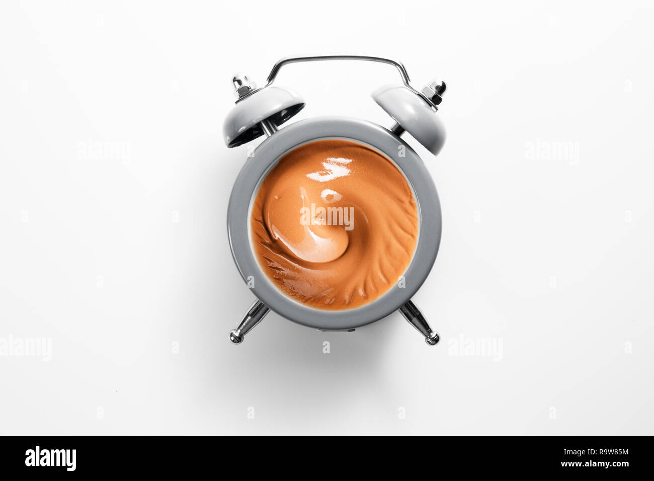Alarm clock with tone cream instead of the dial Stock Photo Alamy