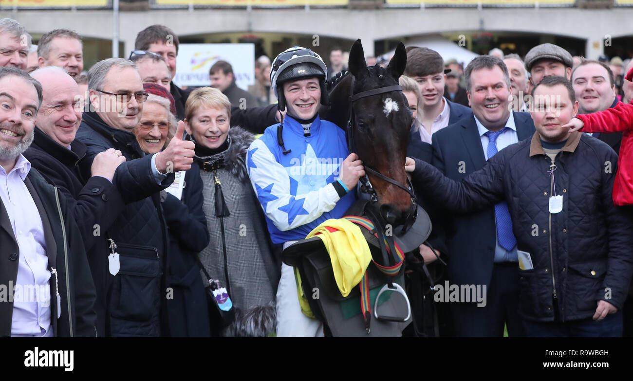 Kemboy in the parade ring with jockey David Mullins and owners, the Supreme Horse Racing Club after winning The Savills Steeplechase during day three of the Leopardstown Christmas Festival at Leopardstown Racecourse. Stock Photo