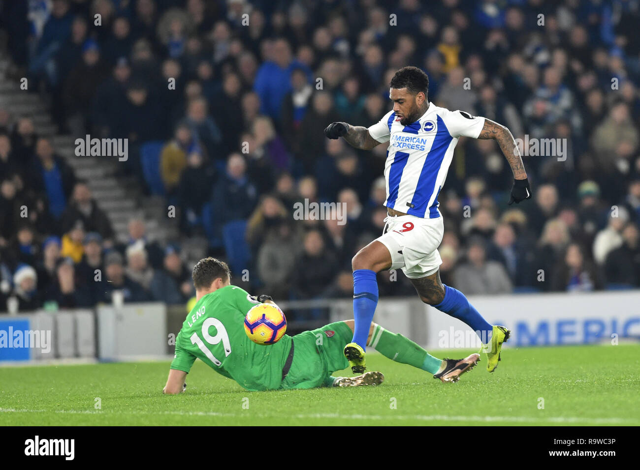 Jurgen Locadia of Brighton goes round Bernd Leno of Arsenal to score the first half equaliser during the Premier League match between Brighton & Hove Albion and Arsenal at the American Express Community Stadium. 26 December 2018 Editorial use only. No merchandising. For Football images FA and Premier League restrictions apply inc. no internet/mobile usage without FAPL license - for details contact Football Dataco Stock Photo