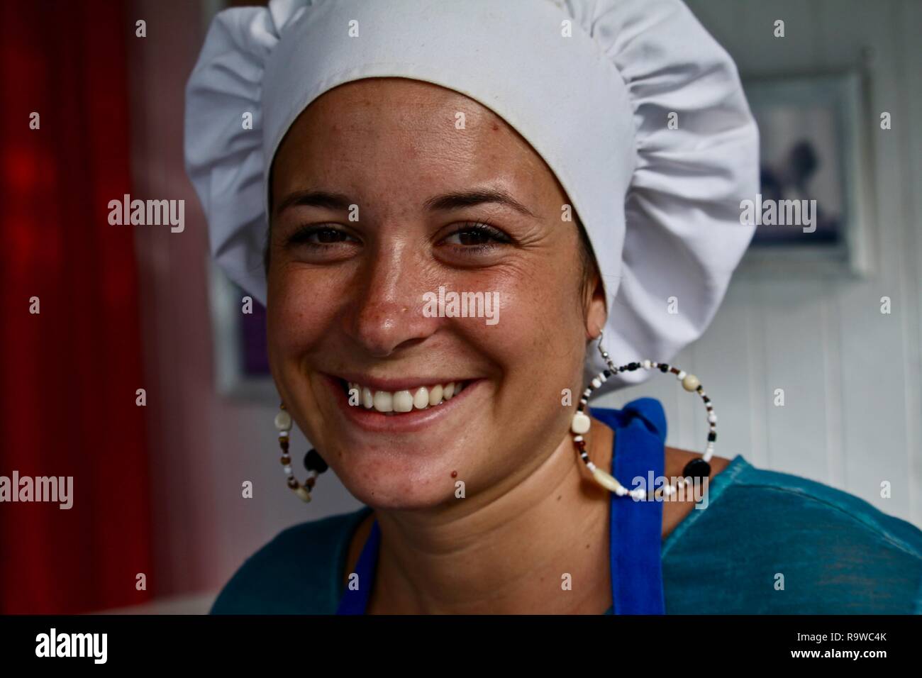 A young French woman chef running her own business on a Caribbean