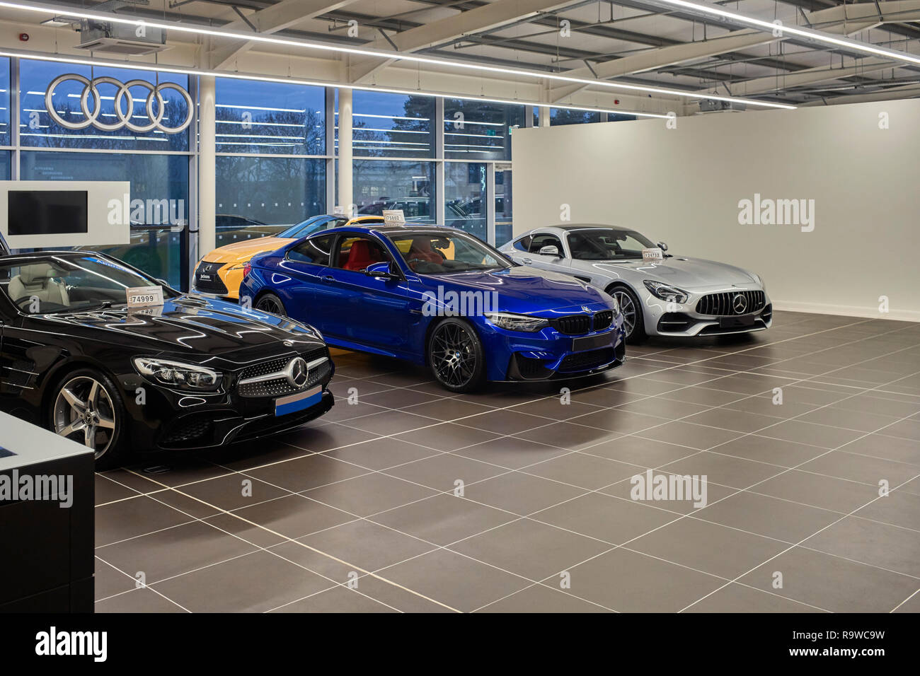 Very expensive cars on show at Jacksons car showroom in Douglas, Isle of Man Stock Photo