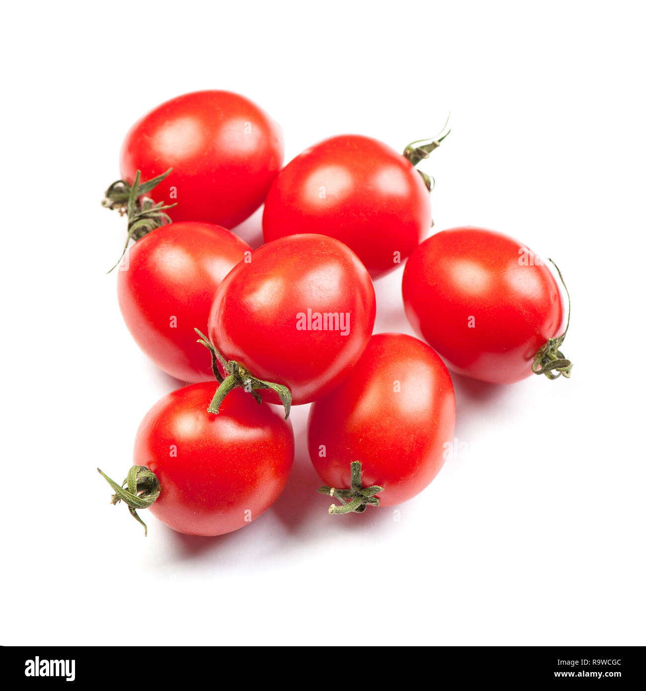 Group of fresh cherry tomatoes isolated on white background Stock Photo ...