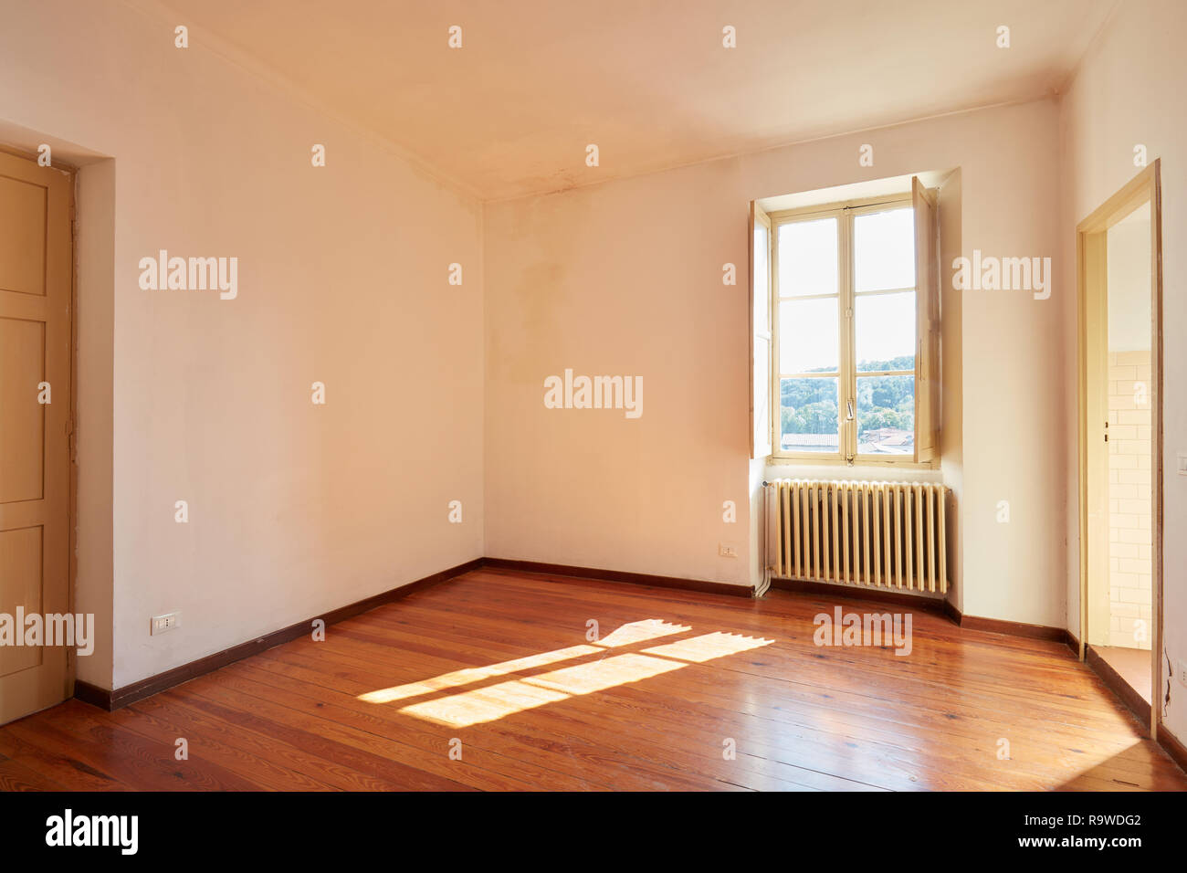 Old empty room with wooden floor in coutry house Stock Photo
