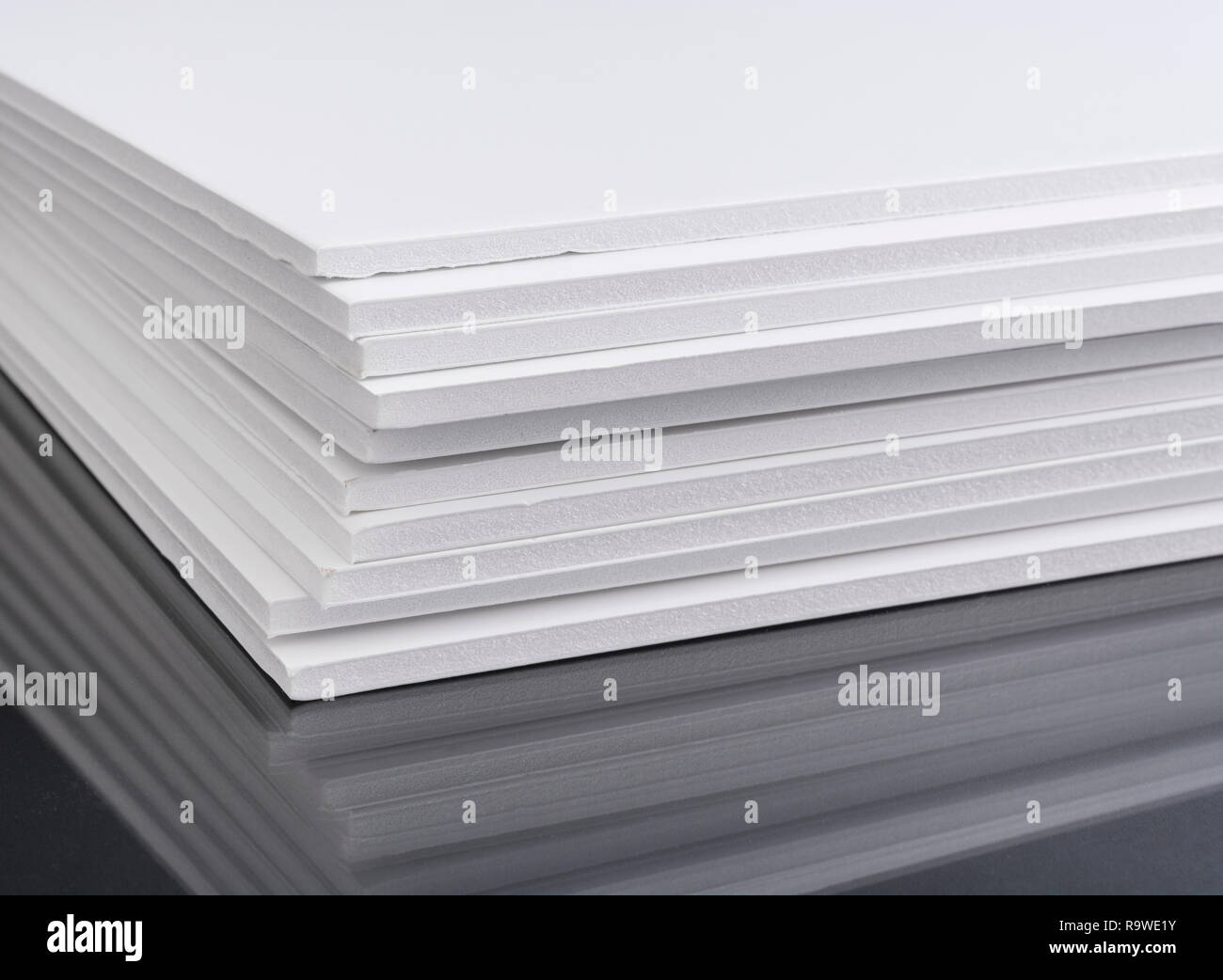 Stack of craft white foam board / Foamboard - used for mounting