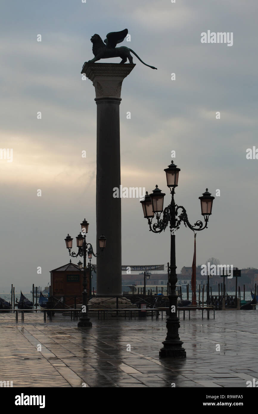Column of Saint Mark (Colonna di San Marco) in Piazzetta di San Marco in Venice, Italy. Stock Photo