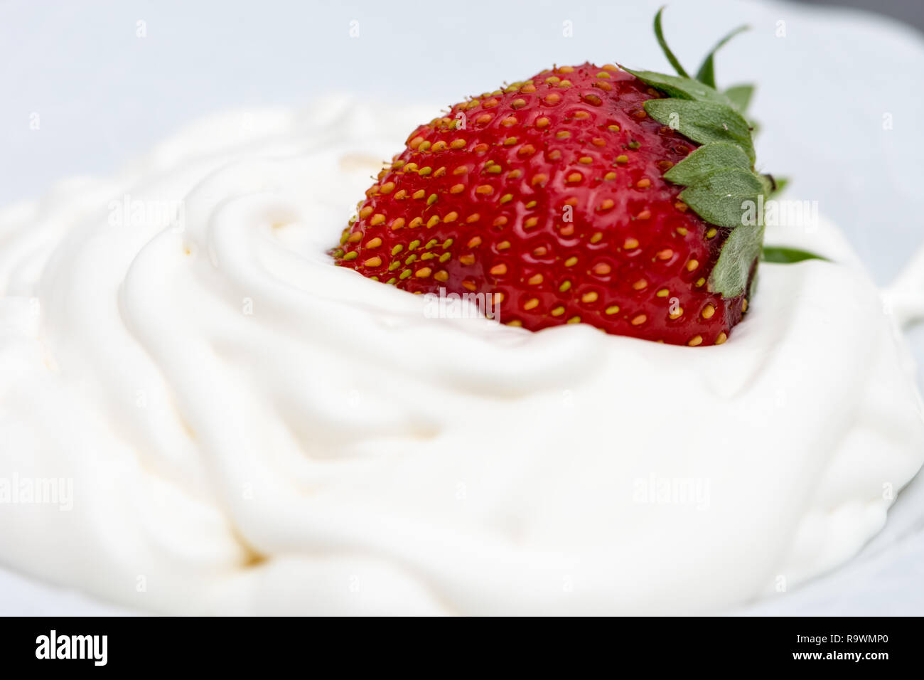 The White Cream And Strawberry Mixing In The Bowl Stock Photo - Alamy