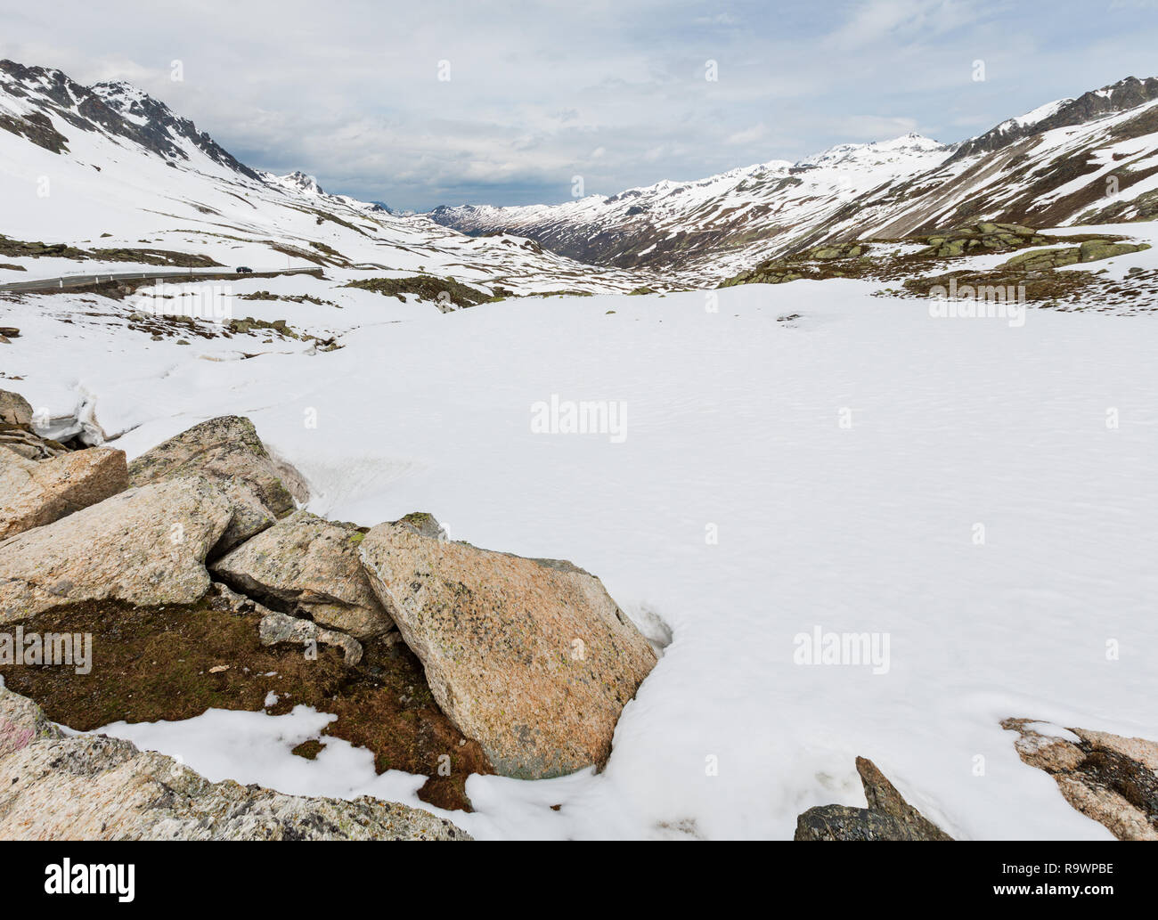 Spring Alps mountain landscape with alpine road (Fluela Pass