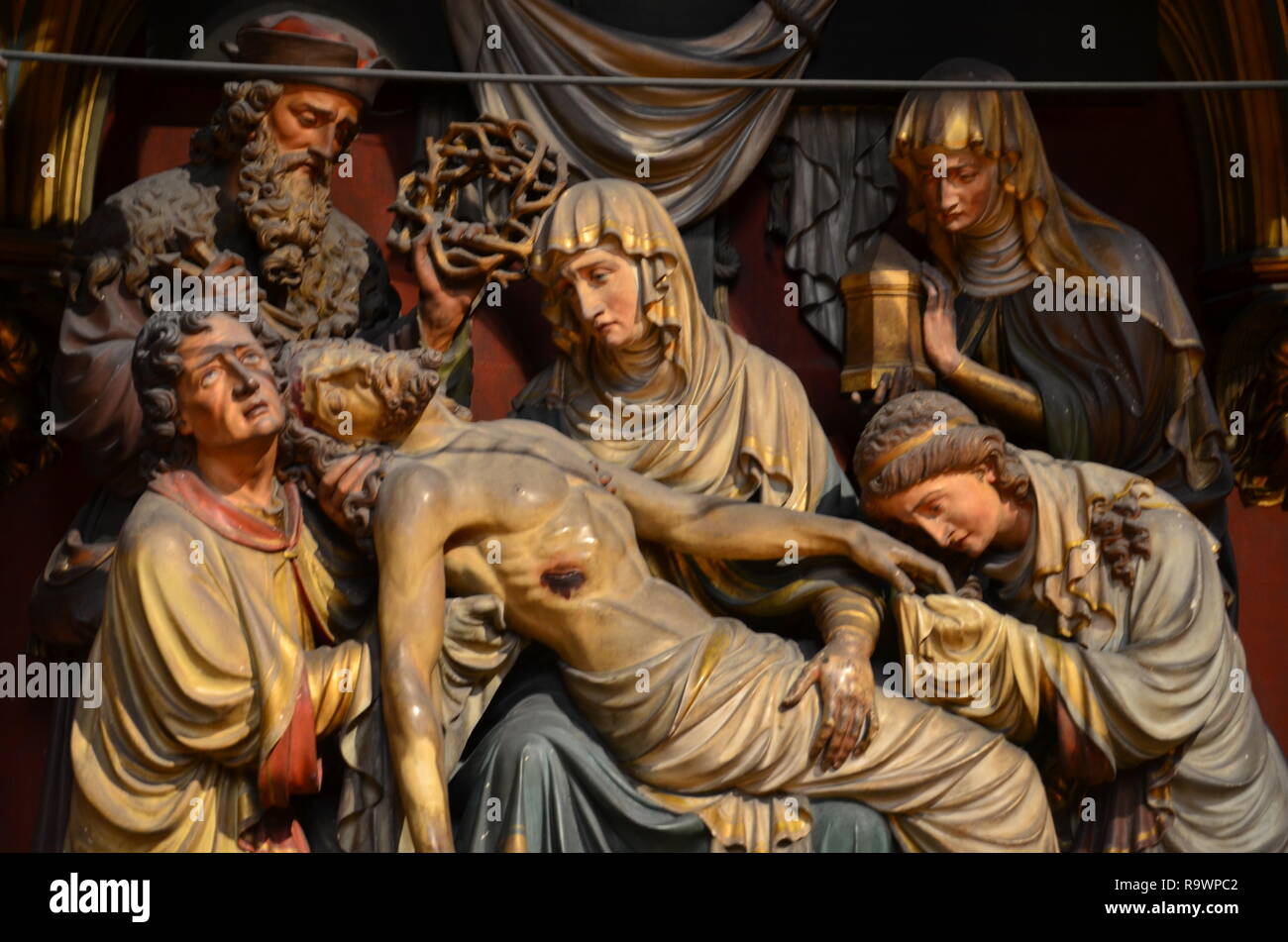 Jesus, Mary and disciples in a relief in Cologne dom church. Stock Photo