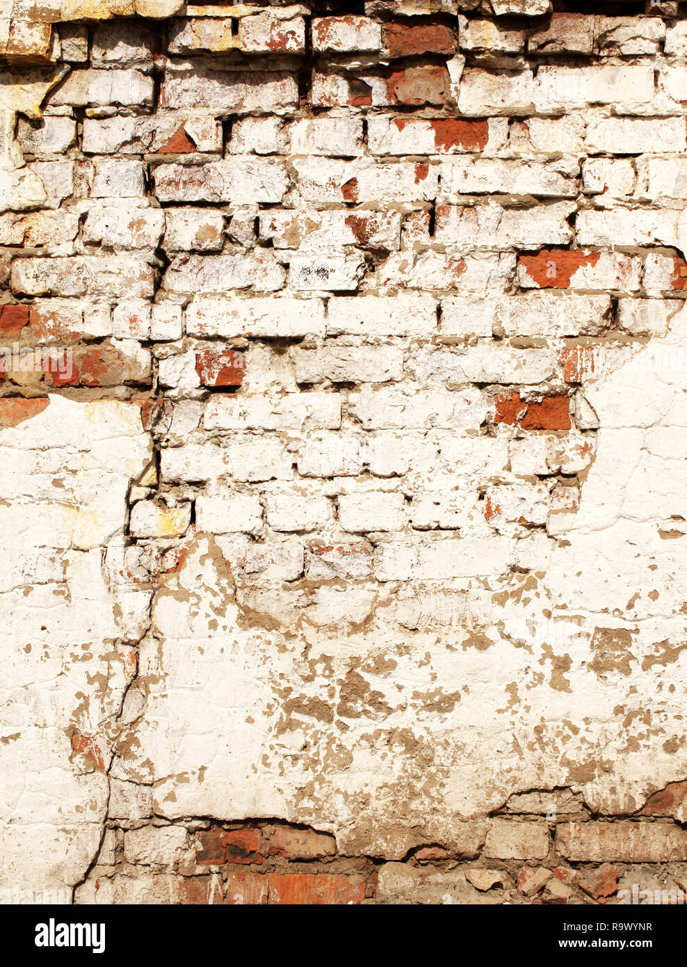 Grunge background with texture of old brick wall painted cracked paint ...