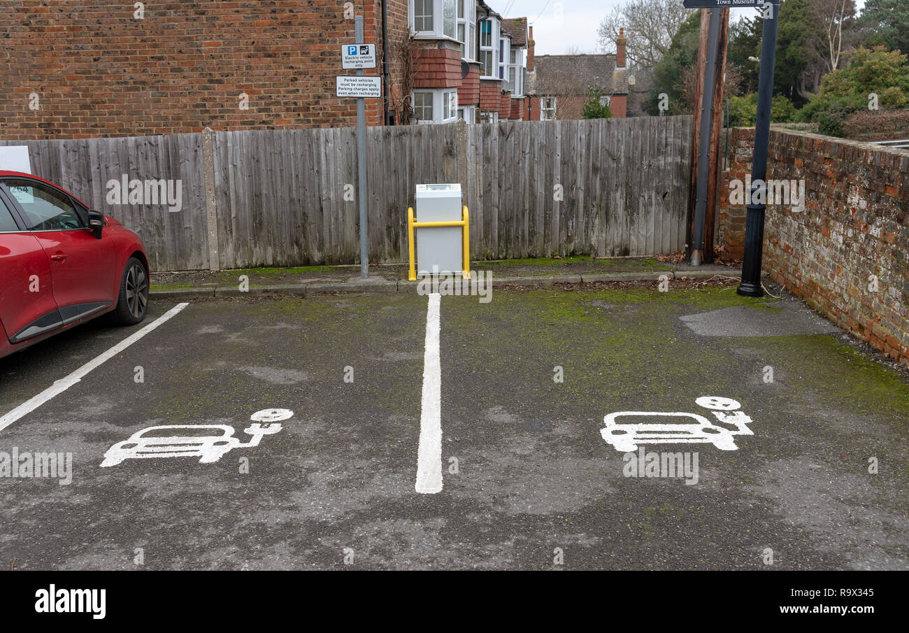 Parking bay for recharging electric vehicles. Parking charges apply